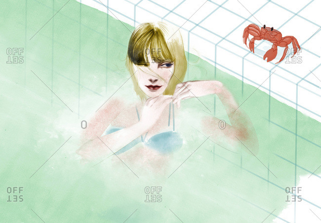 Woman in a swimming pool with a crab