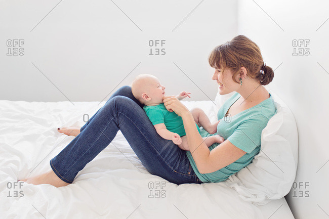 Mother playing with her infant child