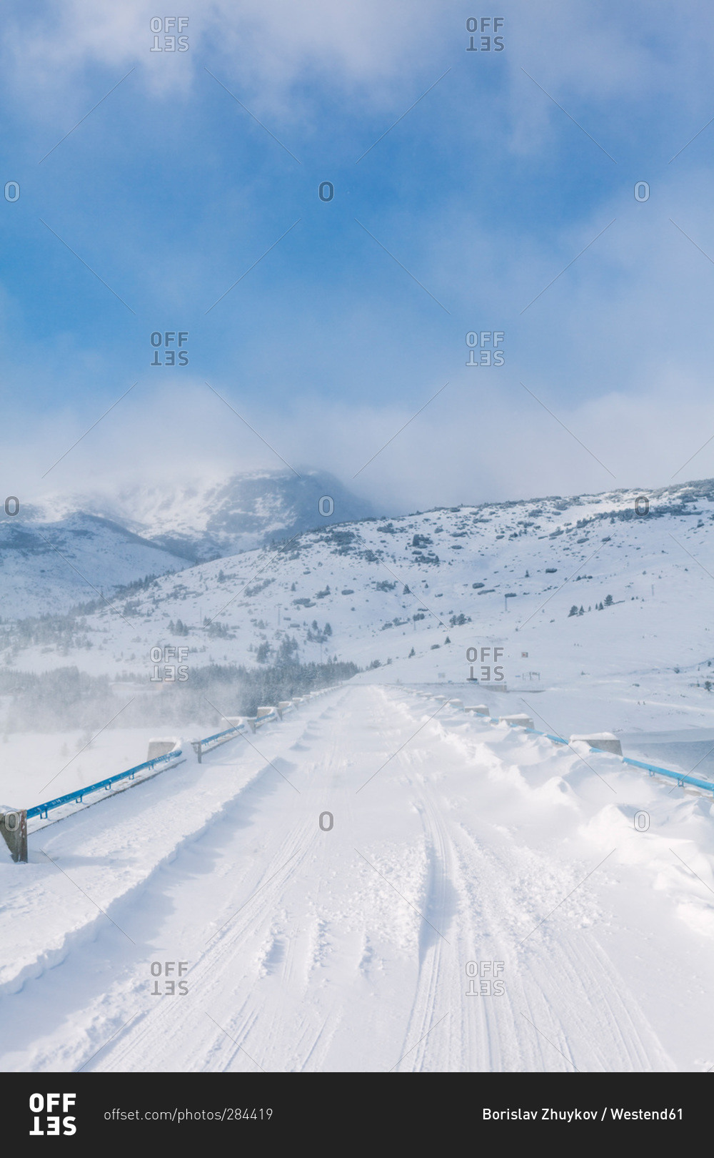 Snowy bridge during cold windy winter, Belmeken Dam, Rila Mountains, Bulgaria