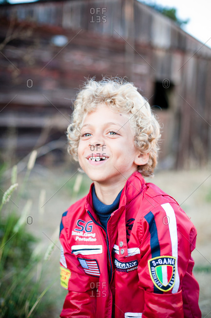 Portrait Of Happy Boy With Blonde Curly Hair Stock Photo Offset
