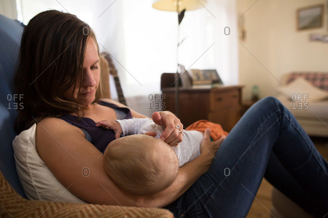 breastfeeding chair stock photos - OFFSET