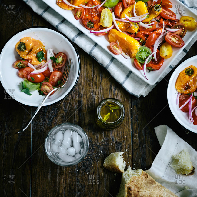Roasted pepper and tomato salad being served
