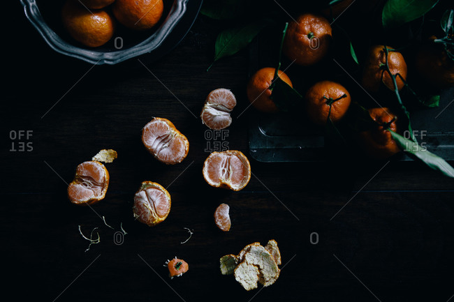 Satsuma citruses whole and peeled