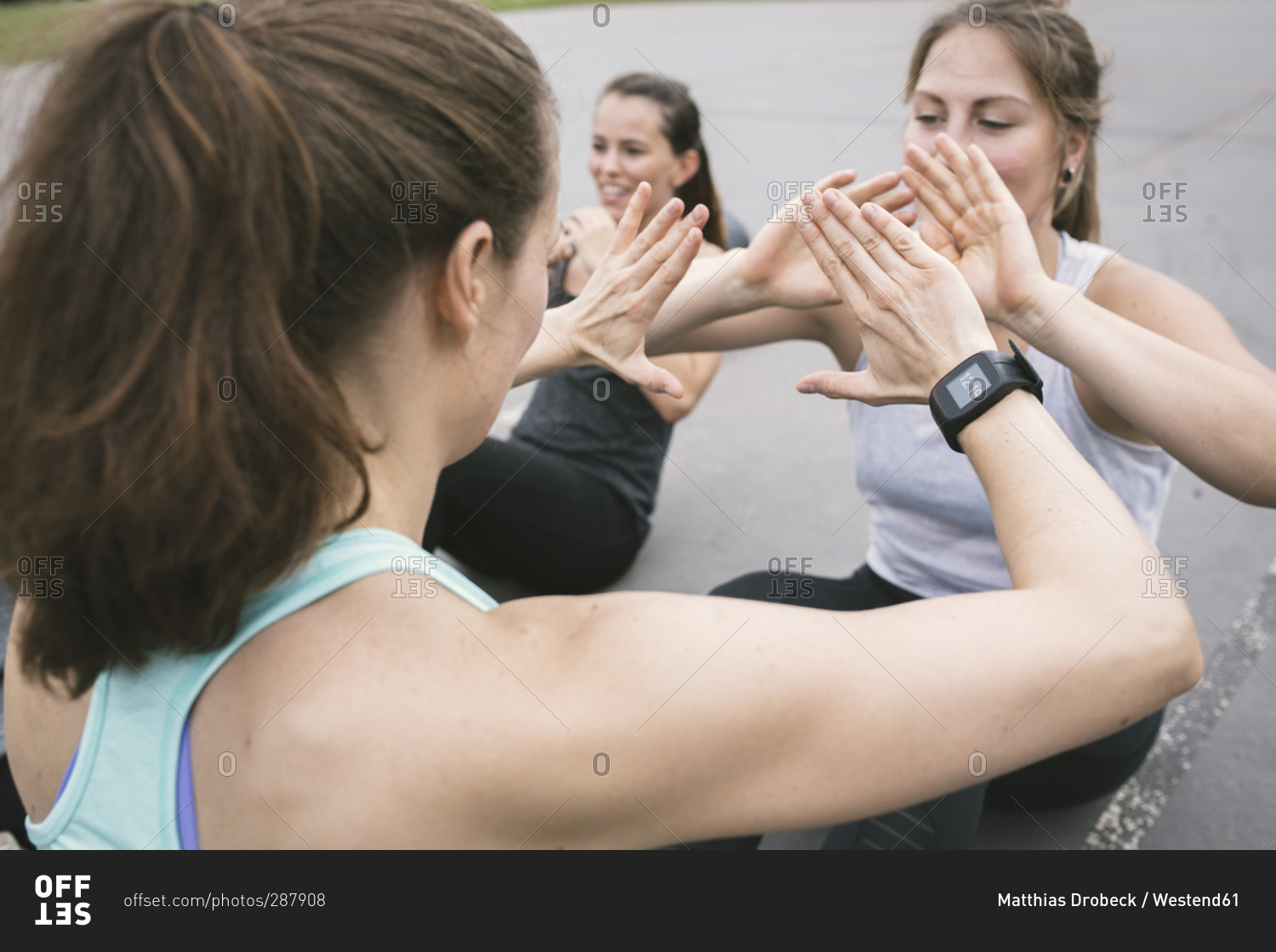Women having an outdoor boot camp workout