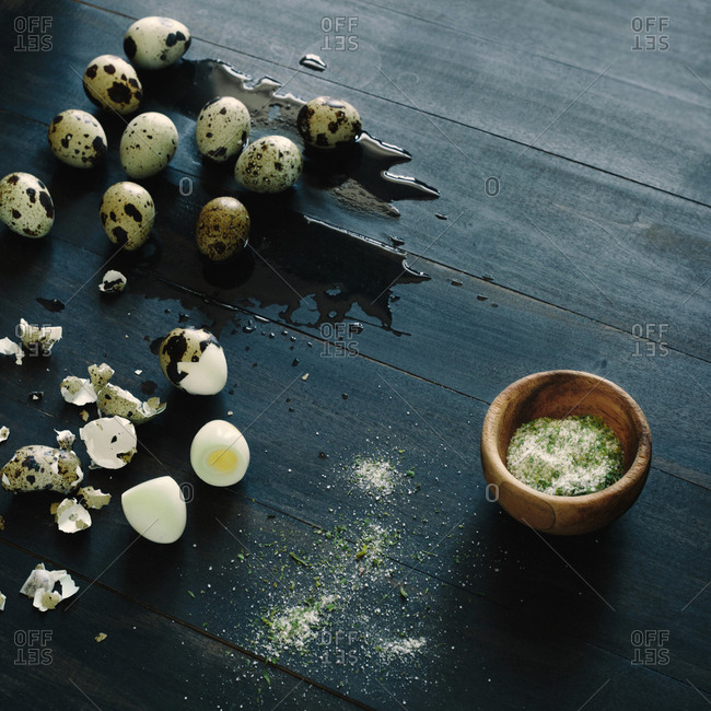 Quail eggs and bowl of salt