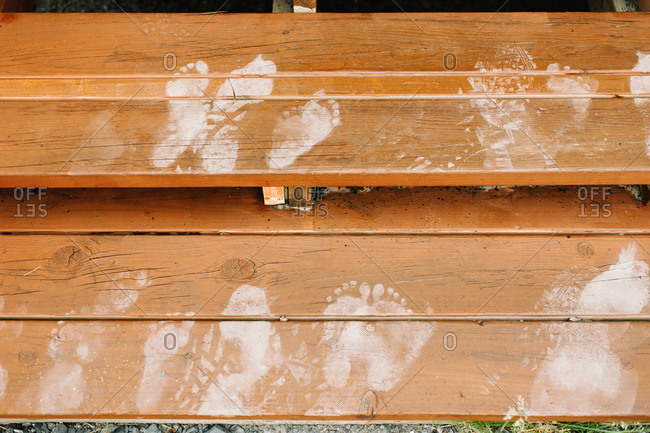 Footprints on wooden steps