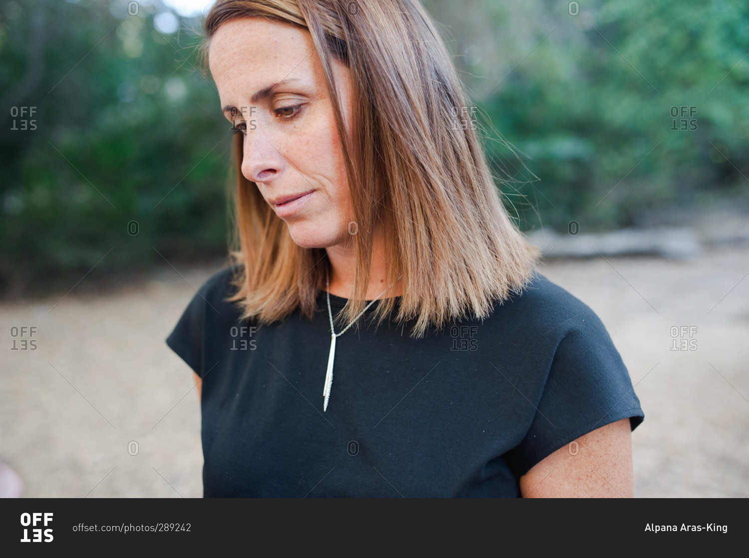 Profile of a woman looking sad