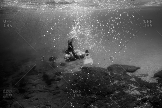 Boy underwater snorkeling in Huatulco, Mexico