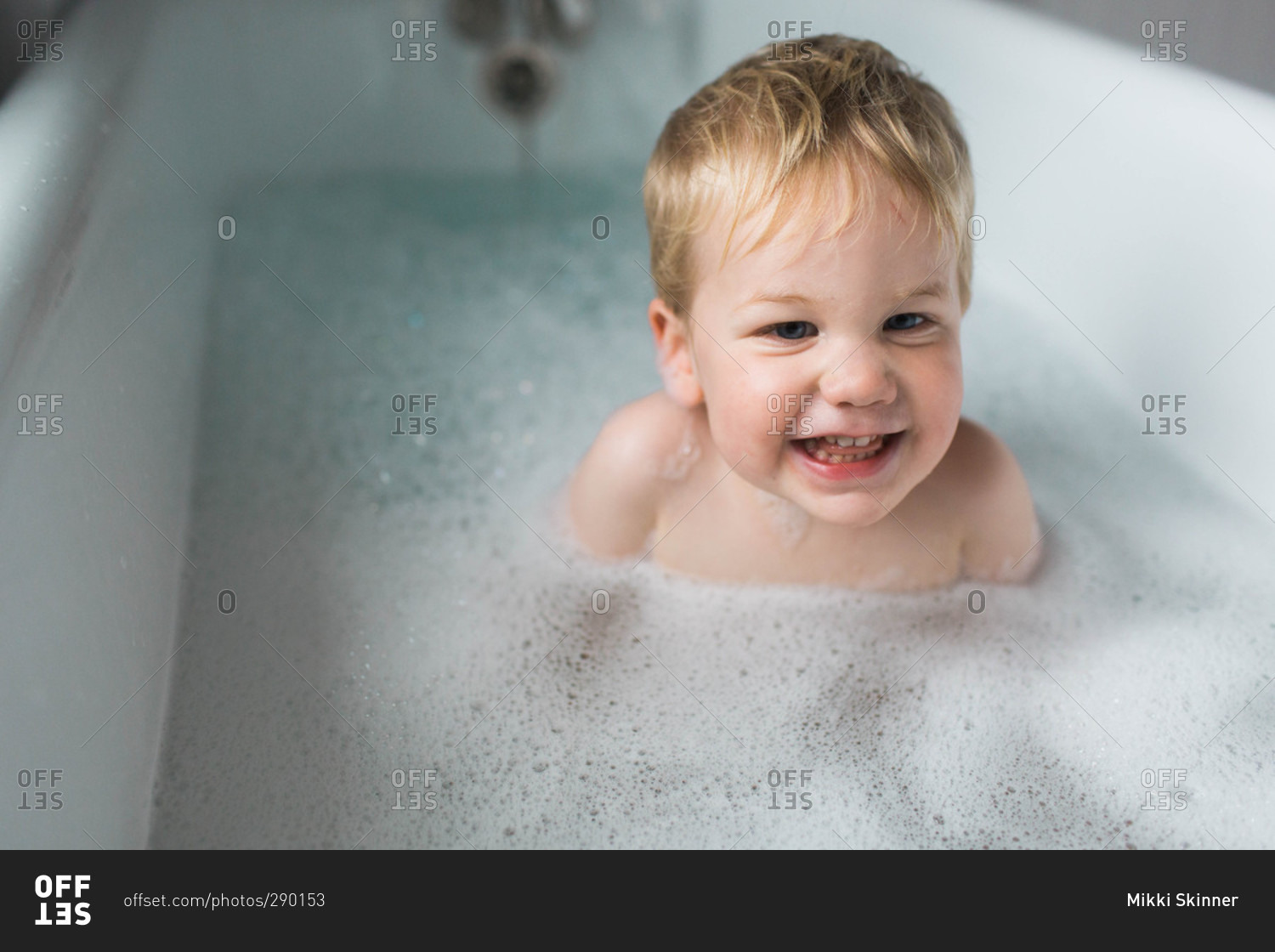 little boys taking a bath