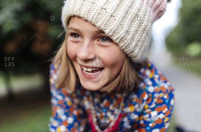 Portrait of smiling girl wearing woolen cap