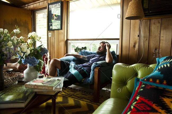 Montauk, New York - July 23, 2011: Relaxing inside the Surf Shack which Chandelier Creative founder Richard Christiansen created for employees
