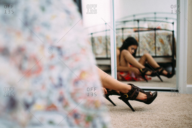 Girl Trying On High Heels Stock Photo Offset