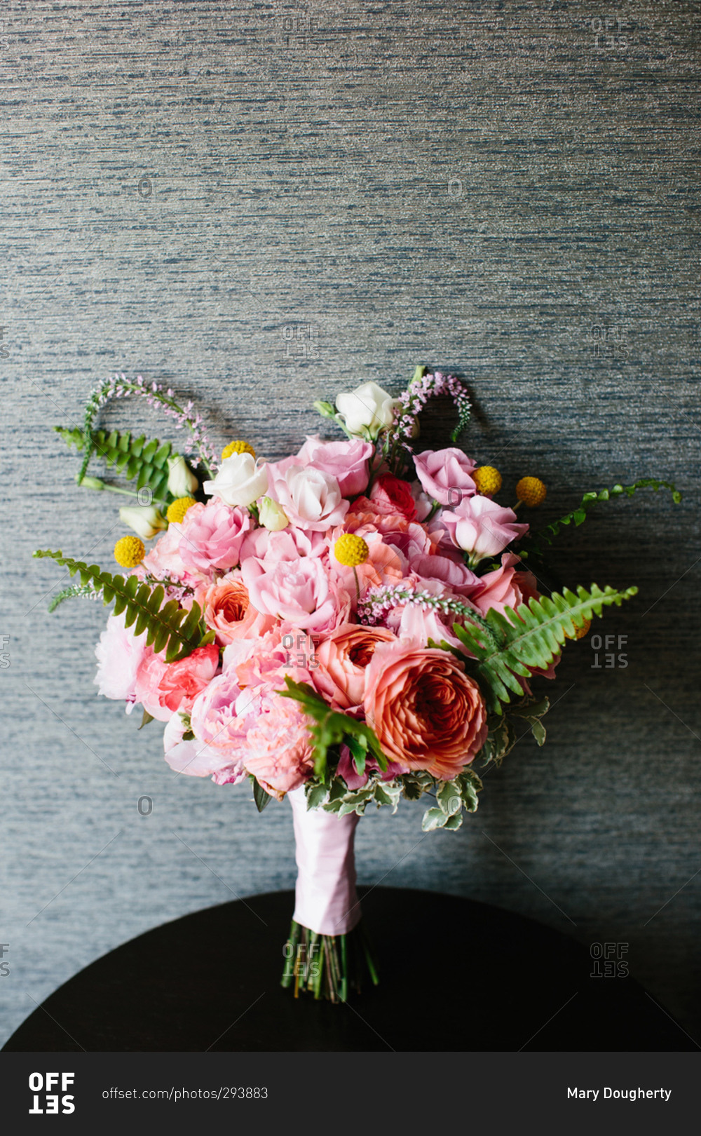 Bride's bouquet with pink roses and peonies