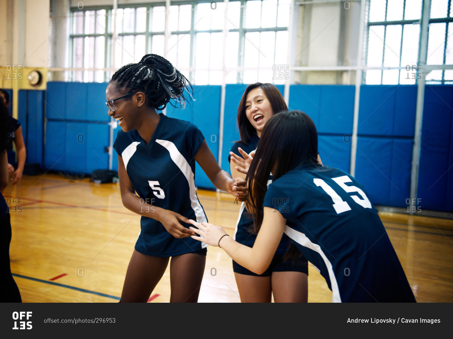 Girls laughing at volleyball practice