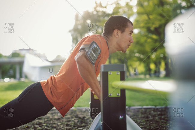 one arm push up stock photos - OFFSET