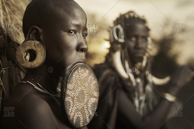 February 20, 2015 Woman with large wooden lip plate and stretched