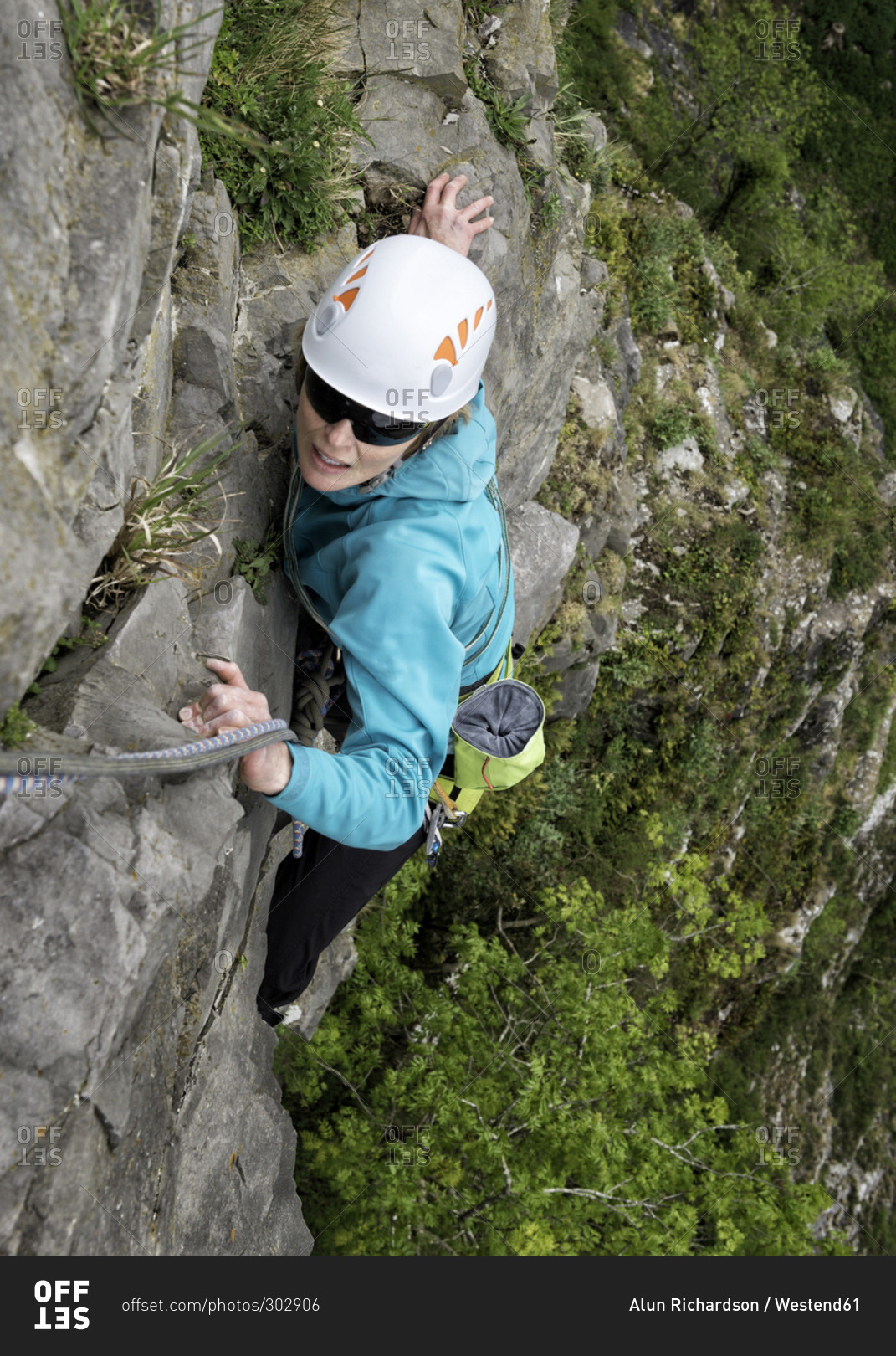 Woman rock climbing the Giant's Cave Buttress