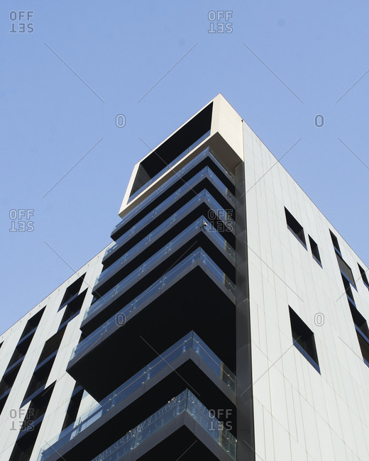 Looking up at a tall building