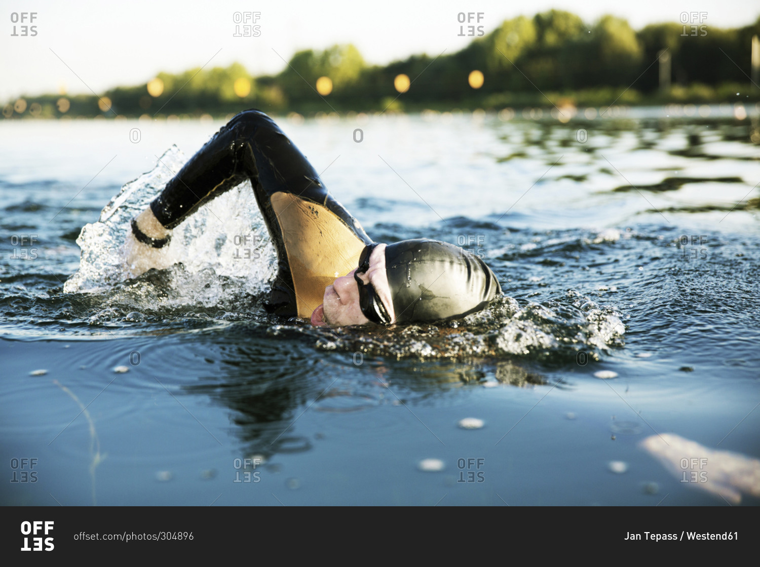 Man swimming in lake