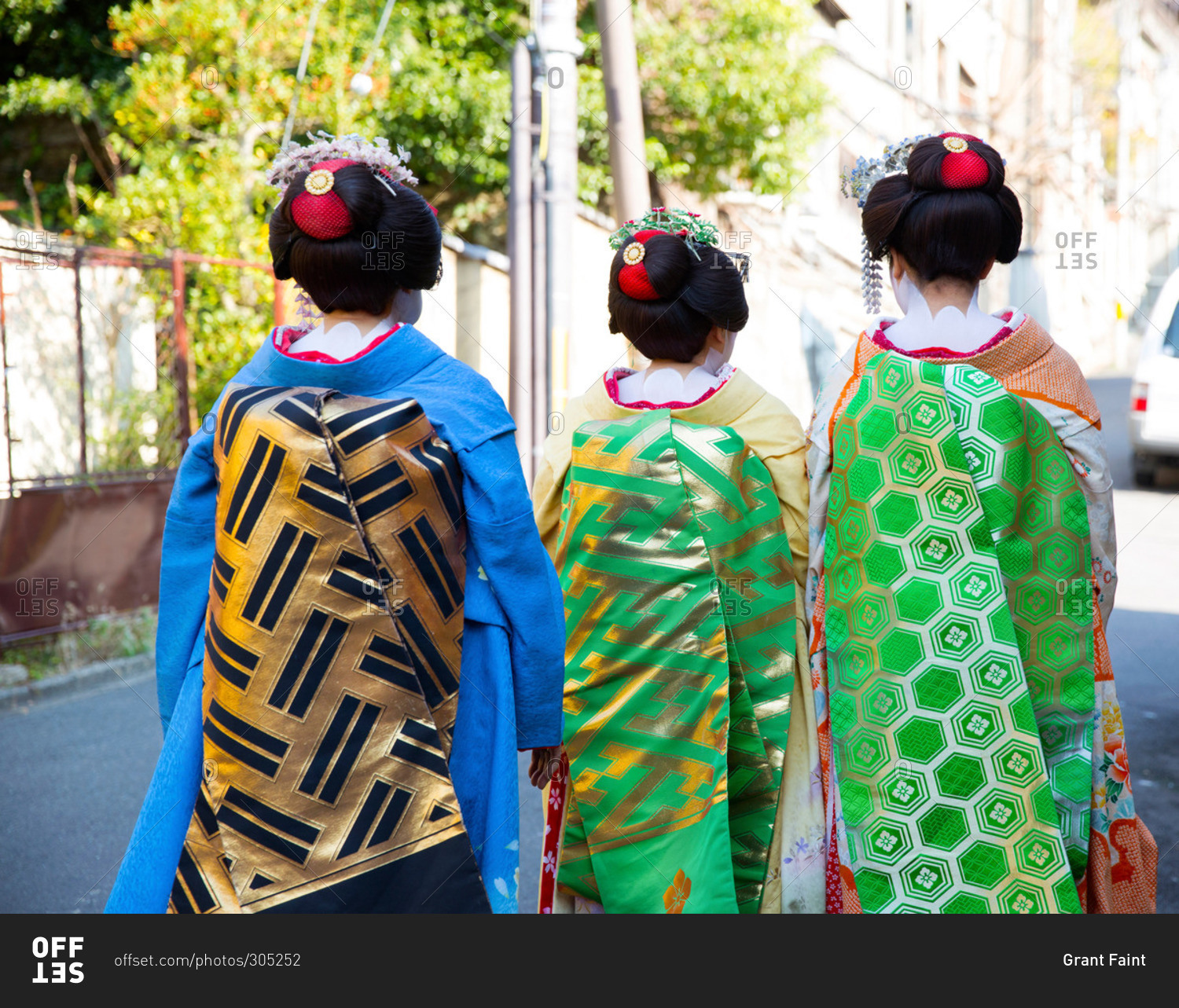 Geishas walking in Japanese street
