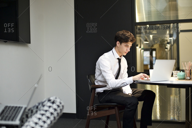 Young business man working on a laptop