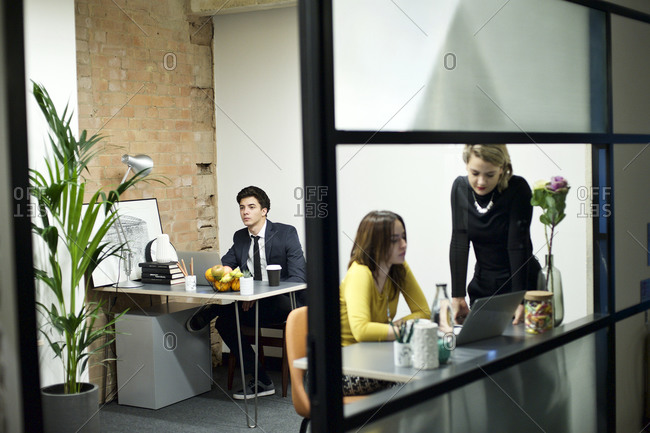 Young business professionals working together in an office