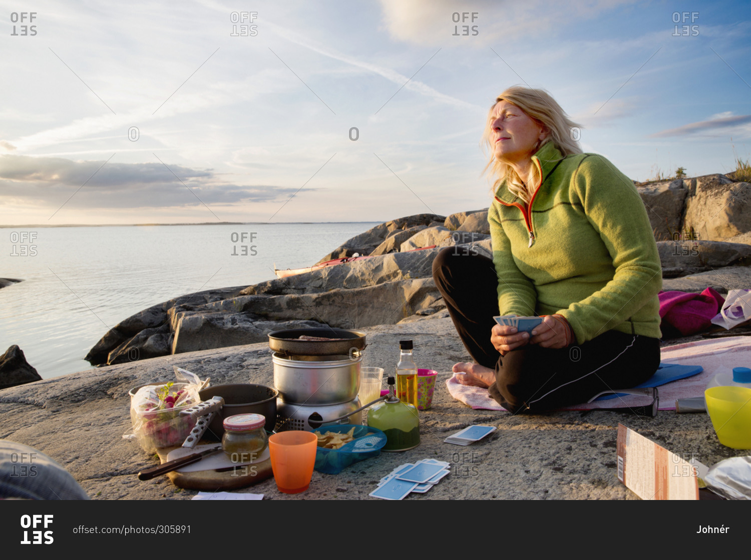 Woman preparing food during camping