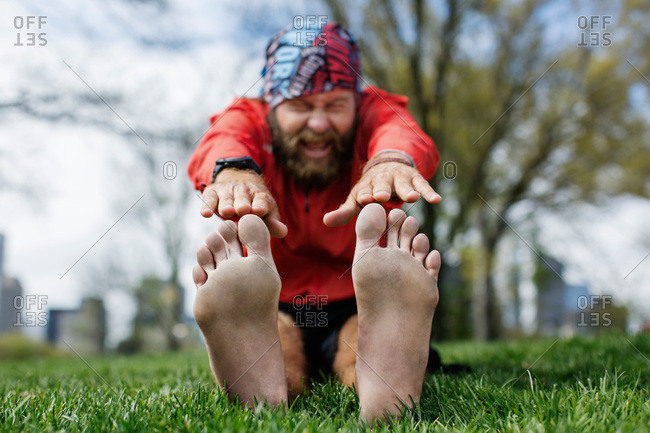 touching toes stock photos - OFFSET