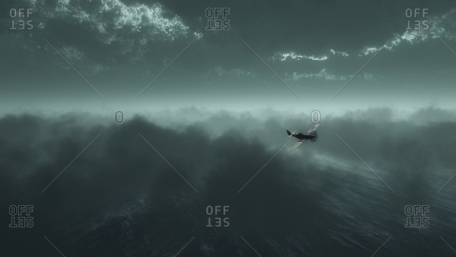 War plane flying over the ocean under stormy sky