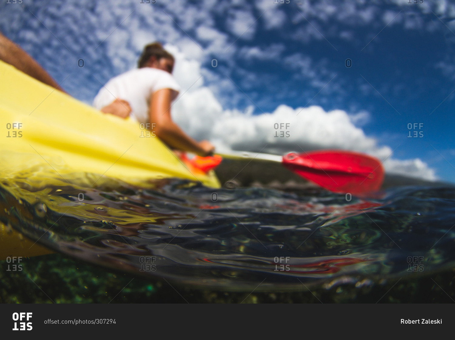 Water shot of a tandem sea kayak in lagoon in Tahiti