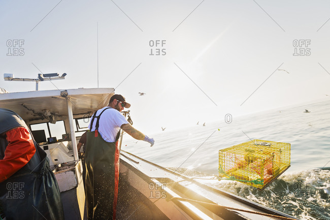 Fisherman working on fishing boat