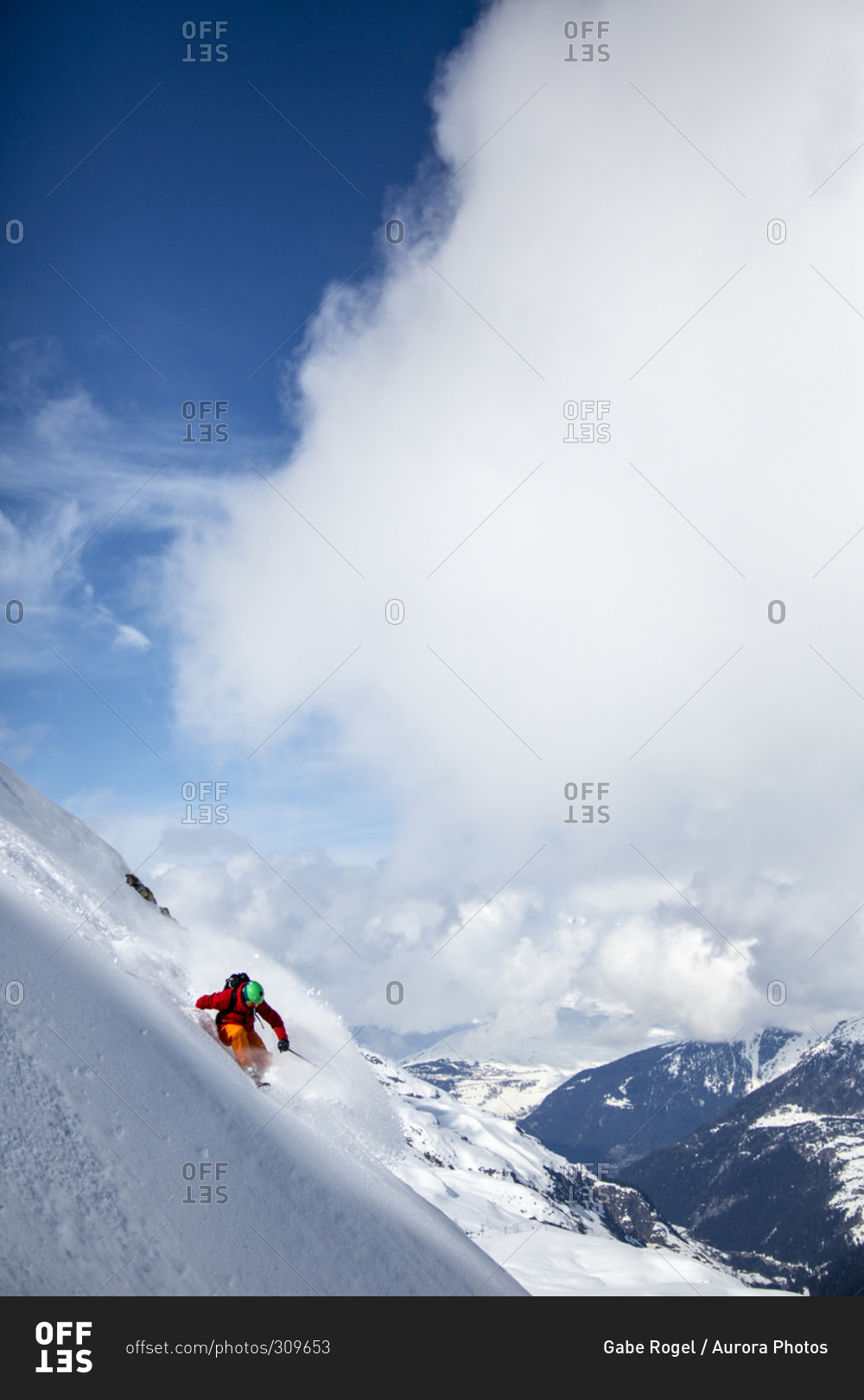 Skiing down a steep slope