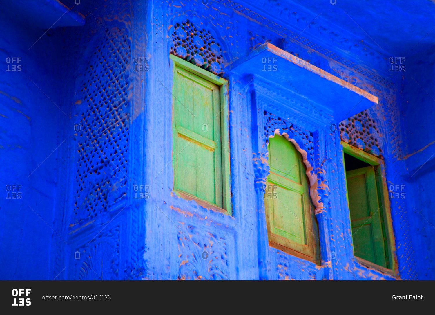 Close up of windows on blue buildings in Jodhpur, India