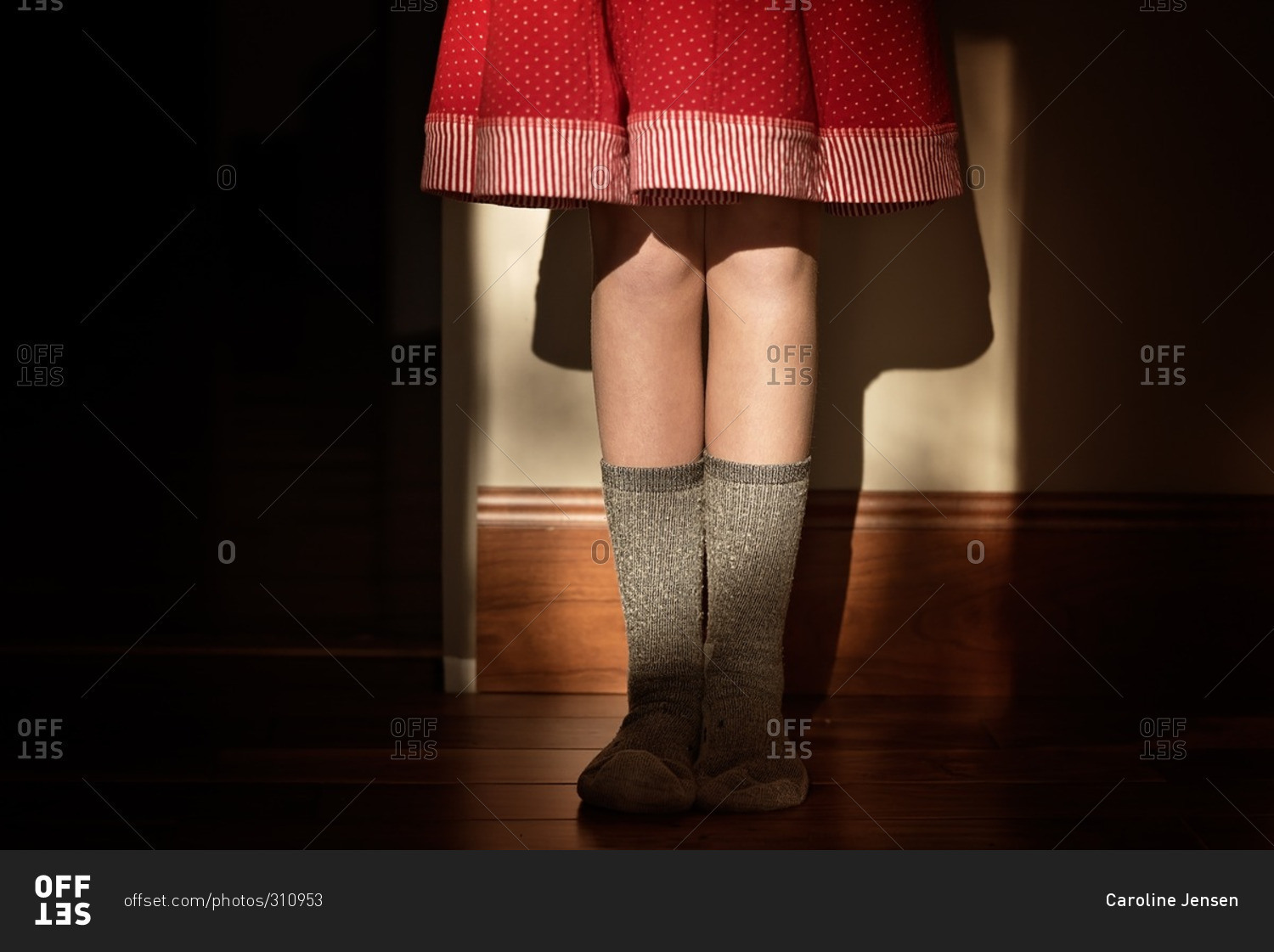 Girl in a skirt and wool socks