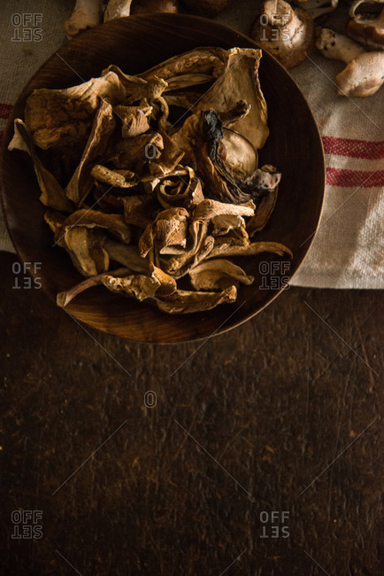 Overhead view of dried mushrooms in bowl