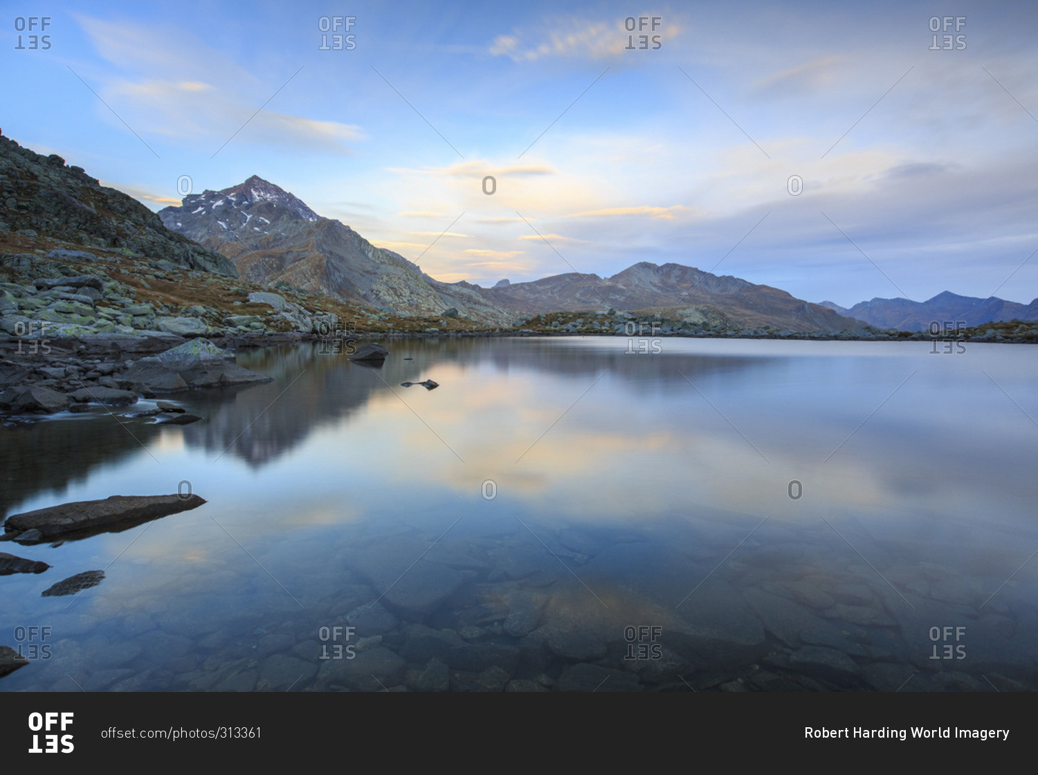 Peak Tambo reflected in Lake Bergsee at dawn, Chiavenna Valley, Spluga Valley, Switzerland