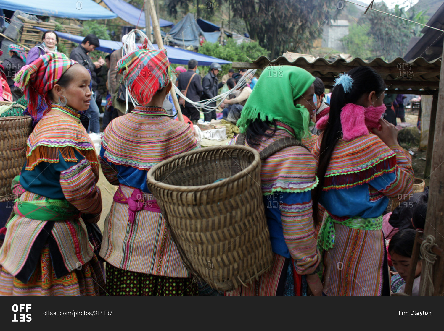 Lung Khau Nhin Market, Vietnam - March 15, 2012: Women shopping at the ...