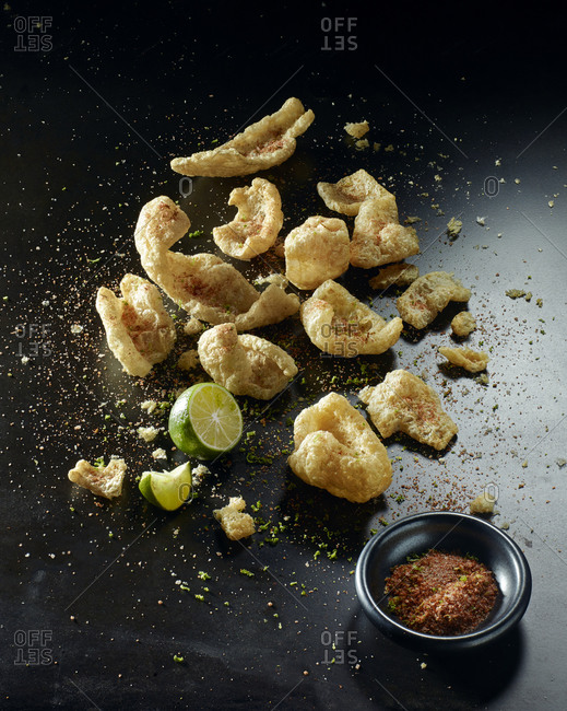 Sweet and salty pork rinds with lime and seasonings