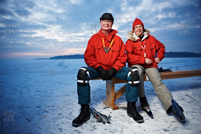 Elderly couple sitting on a bench