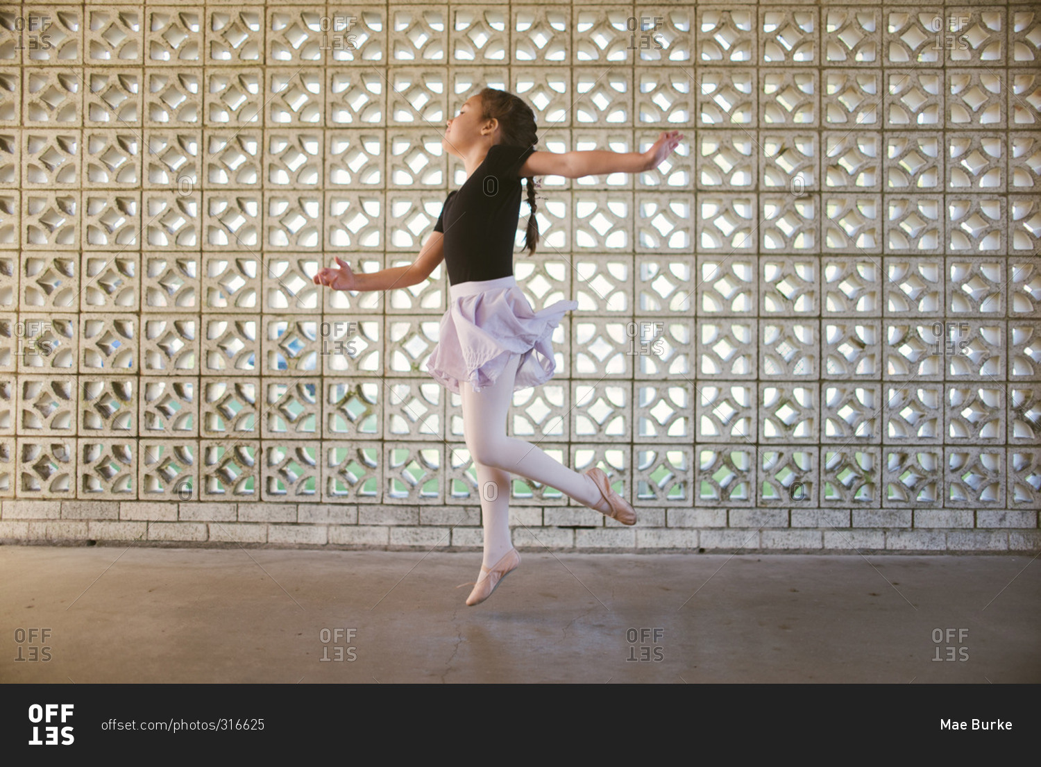 Girl doing ballet jump