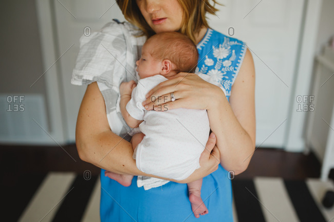 Mother holding newborn baby