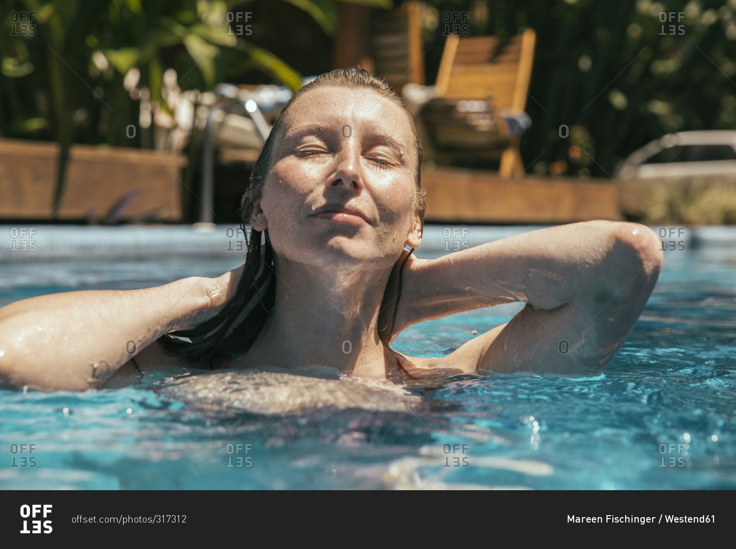 Portrait of relaxed woman in a swimming pool, Porto Seguro