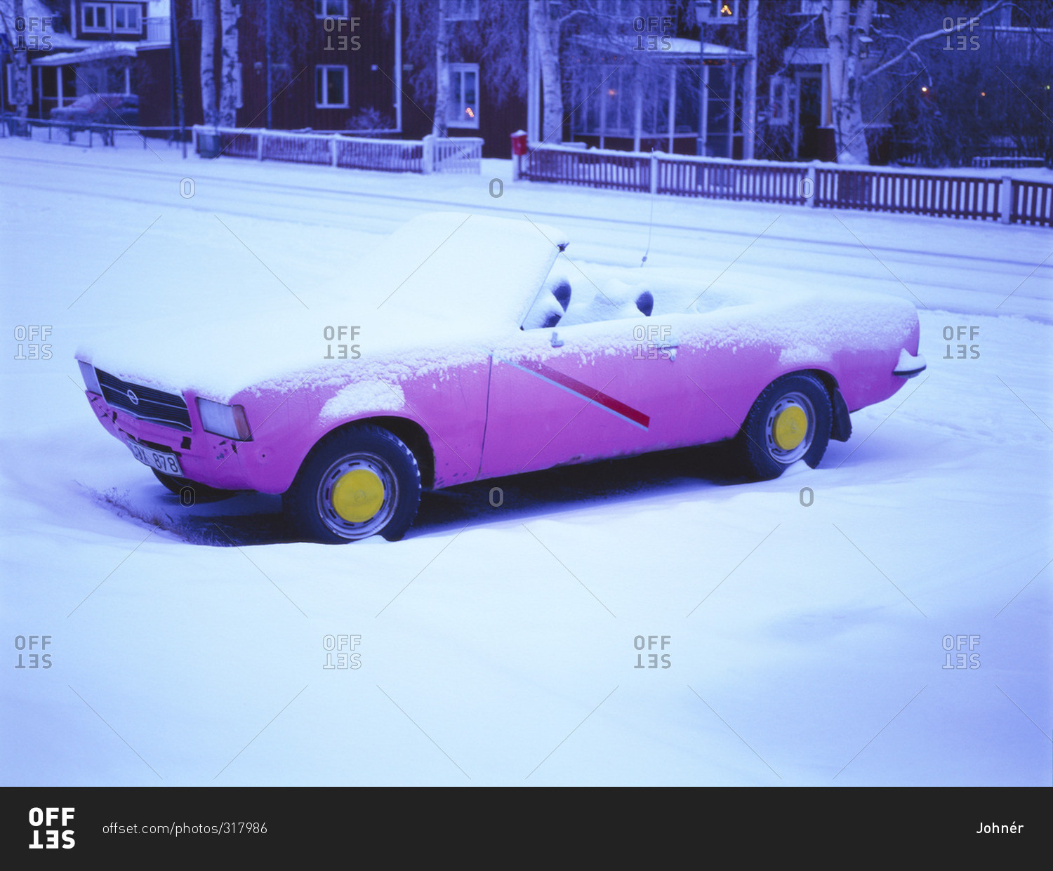 A convertible car covered in snow stock photo OFFSET