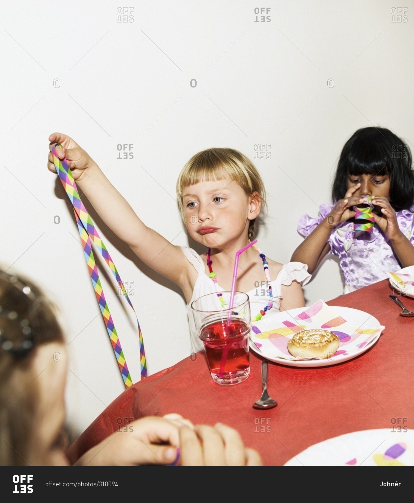 Three girls at a childrenÕs party