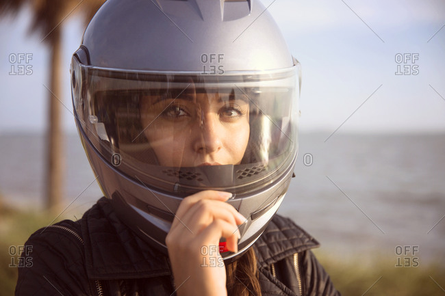 Portrait of woman in motorcycle helmet
