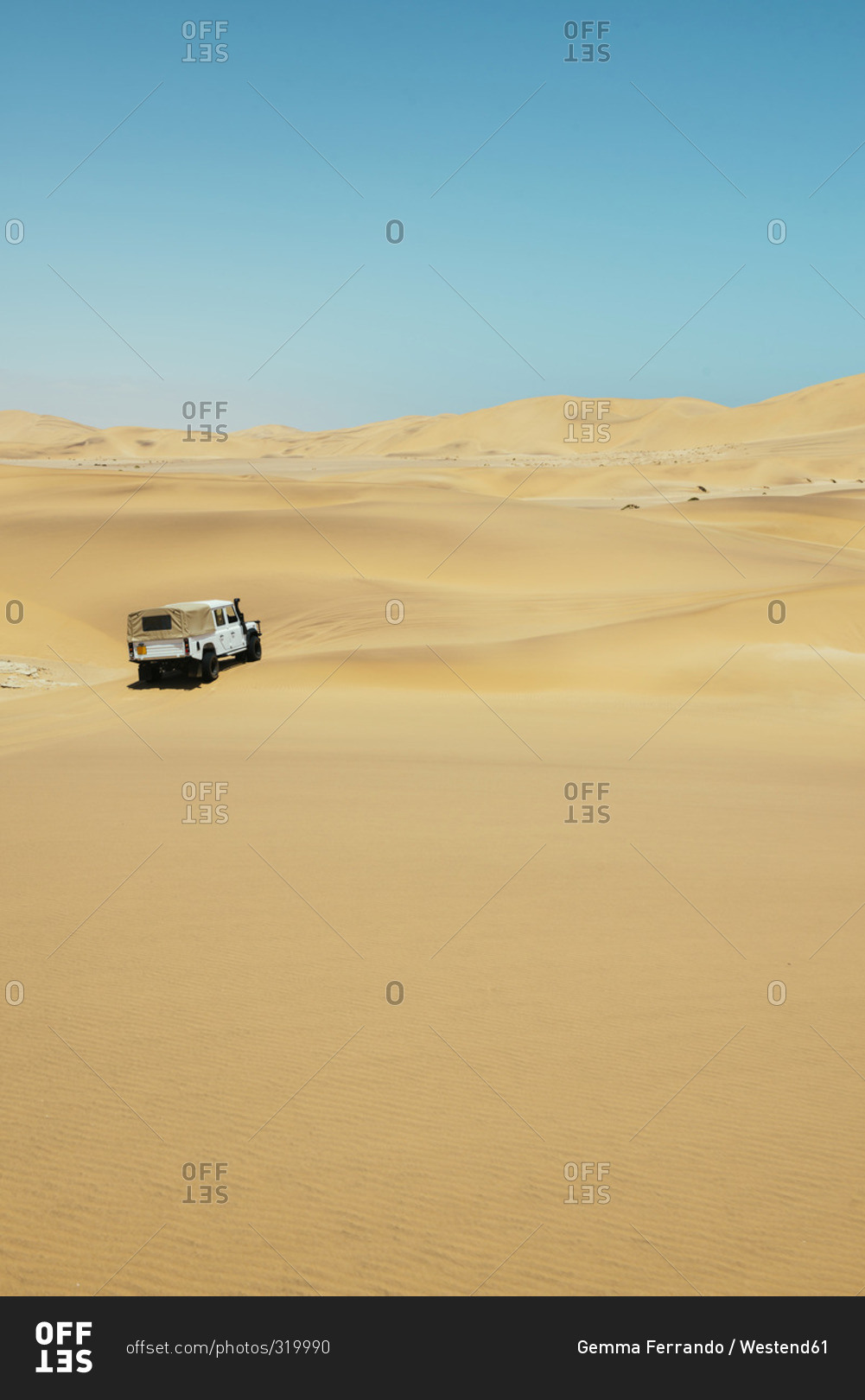 Namibia, Namib desert, Swakopmund, 4x4 car driving among the dunes in the desert