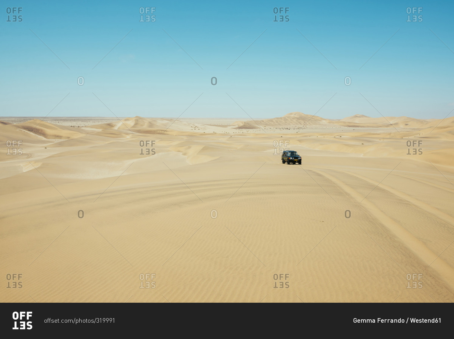 Namibia, Namib desert, Swakopmund, 4x4 car driving among the dunes in the desert