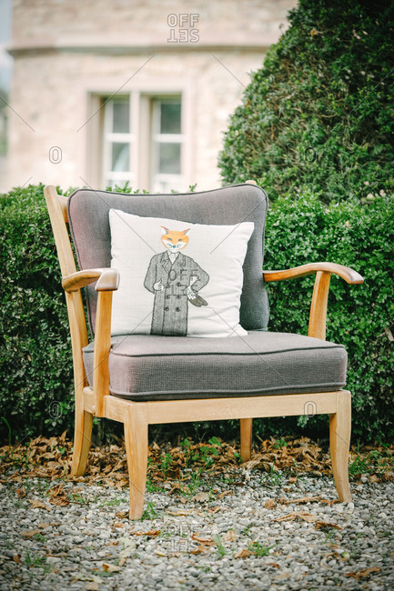 Vintage armchair with fox pillow
