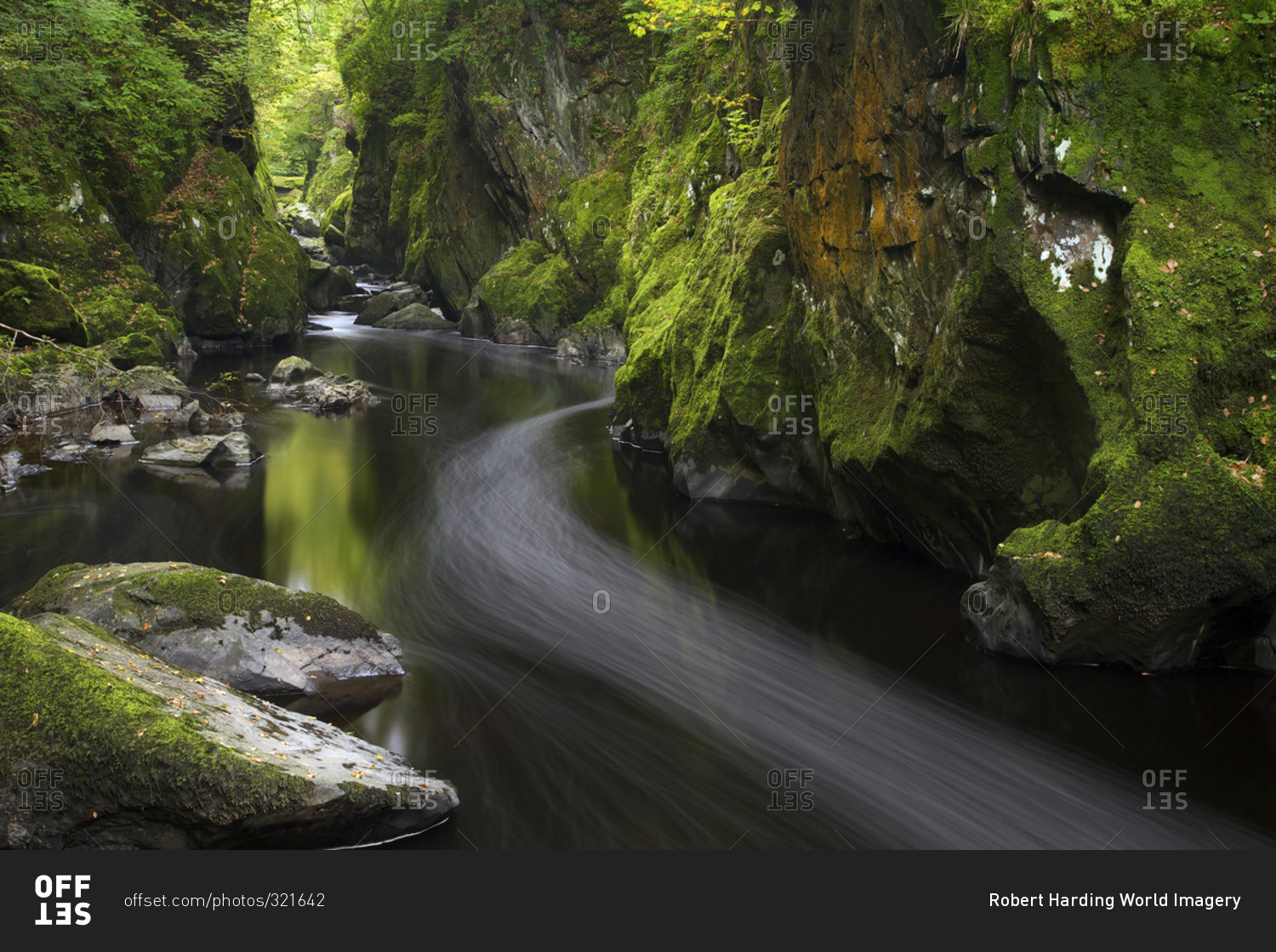 River in mossy canyon, Wales stock photo OFFSET