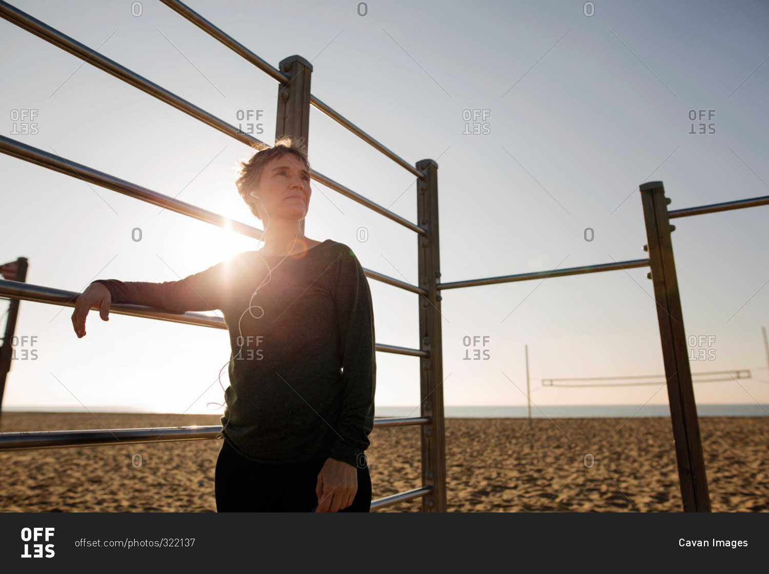 Athletic woman gazing off on beach